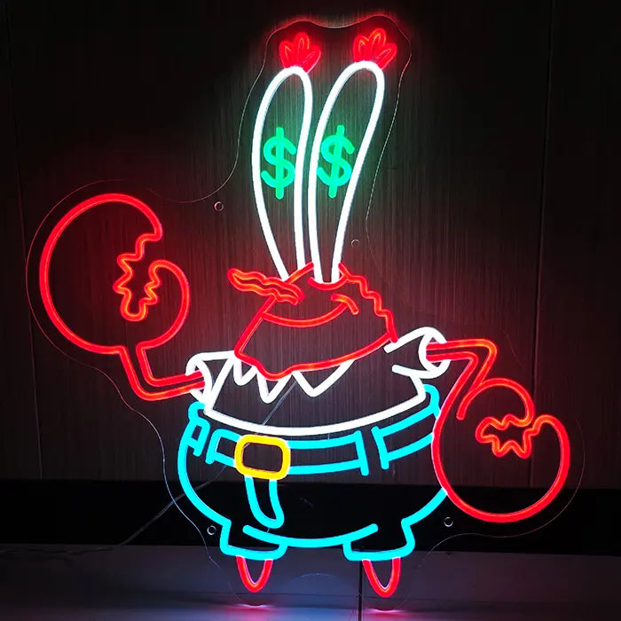 Krebs Neon LED Schild leuchtet im dunklen Raum an der Wand, rote Scheren und grüne Dollarzeichen in den Augen