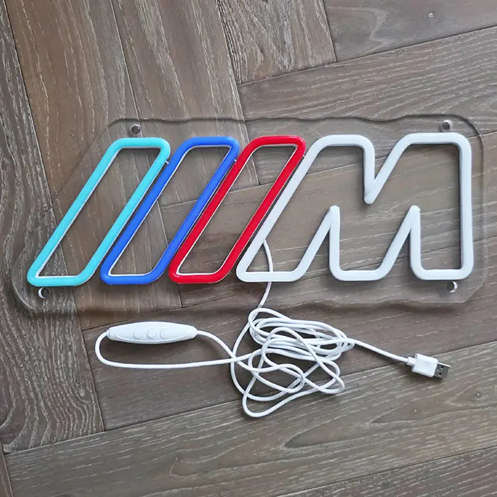 M Stripes neon LED sign, close-up of the LED neon flex on the clear backing panel