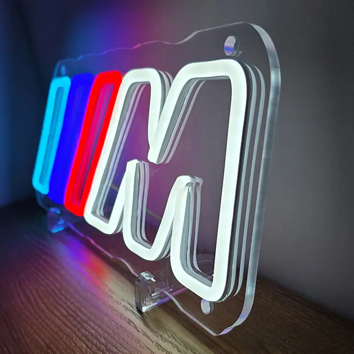 M Stripes neon LED sign, fully in frame, complete outline of the design
