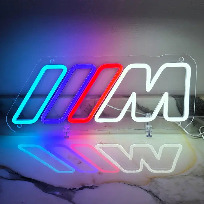 M Stripes neon LED sign, with the connecting cable visible along the bottom edge