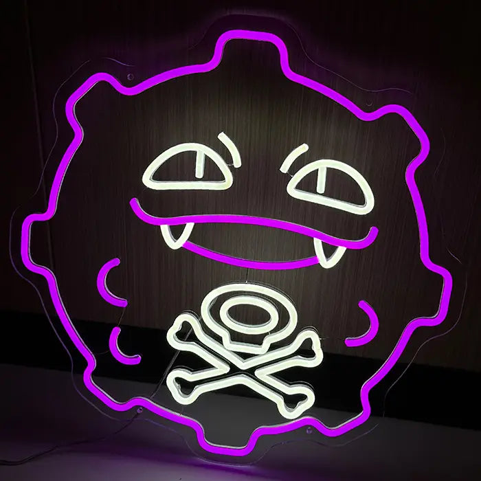 Kugelfigur Neon LED Schild in Lila und Weiß, frontal an dunkler Wand, mit Grinsen und Totenkopf-Symbol