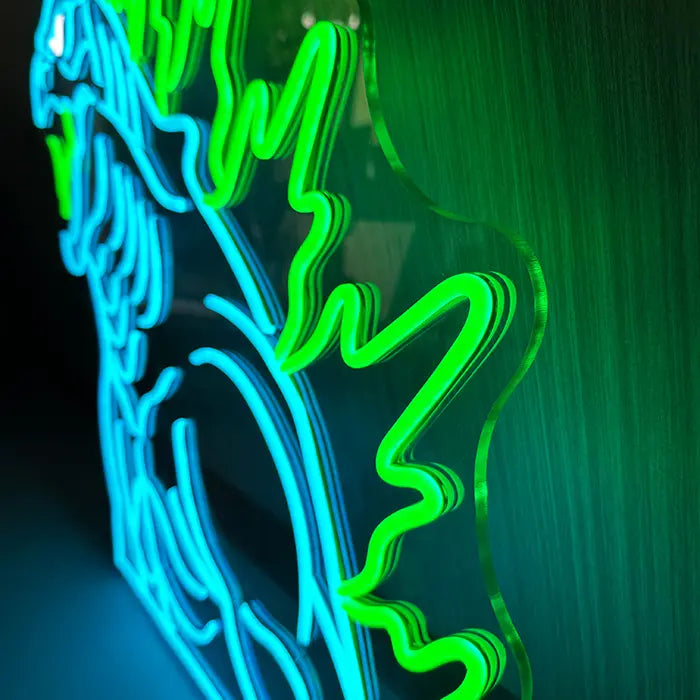 Godzilla Neon LED Sign in close-up, the jagged back plates running over the acrylic edge