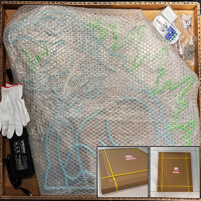 Godzilla Neon LED Sign packed in the shipping box with bubble wrap, power adapter, gloves and remote