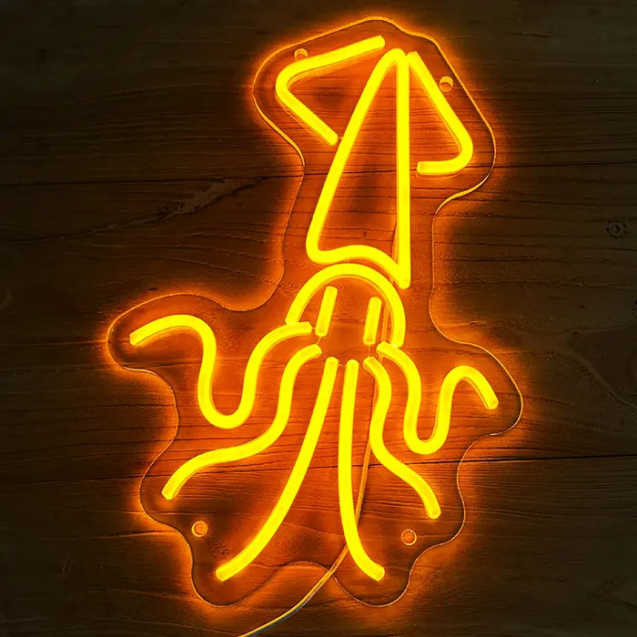 Gold Octopus Neon LED Sign head-on on a wooden wall, tentacles and body glowing warmly