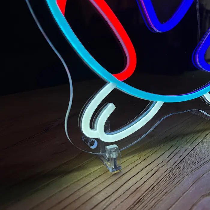 Pokémon Togepi Neon LED Sign in close-up, neon tubing and stand on the edge of the acrylic