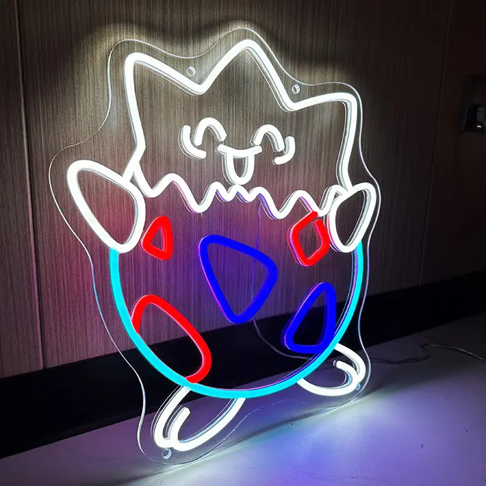 Pokémon Togepi Neon LED Sign standing against the wall, the whole figure with feet and arms visible