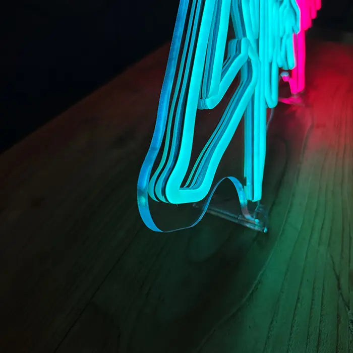 CYBERPUNK Neon LED Sign at an angle from the side, the neon tubing sits proud of the clear acrylic