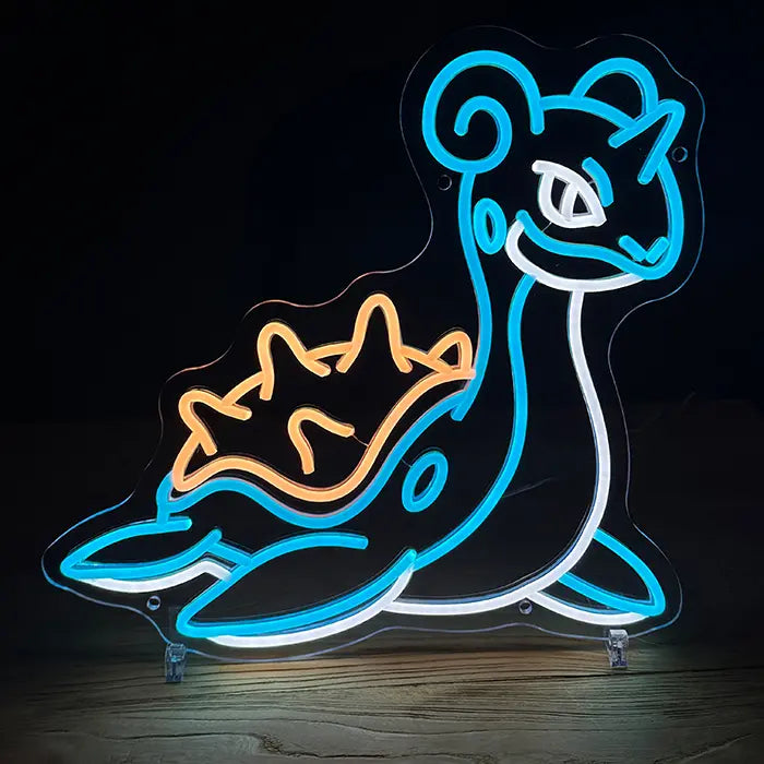 Pokémon Lapras Neon LED Sign on stands on a wooden table, shell glowing orange