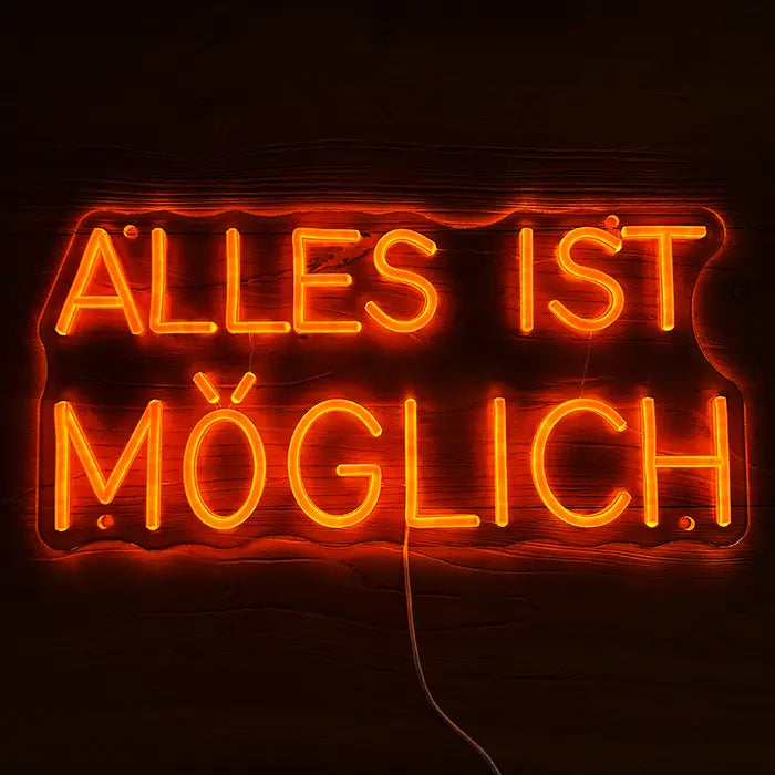 Anything Is Possible Neon LED Sign front view against a dark background, capital letters in orange