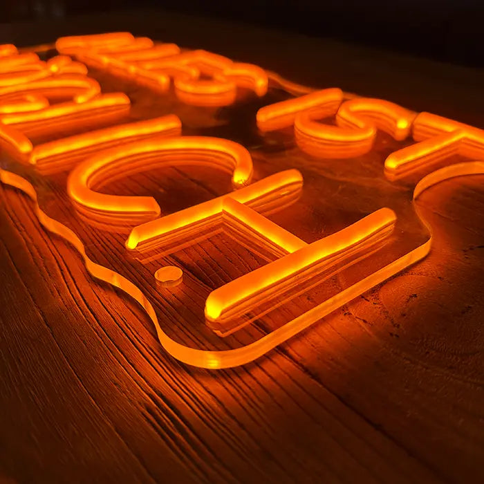 Anything Is Possible Neon LED Sign in close-up at an angle, letters raised on clear acrylic