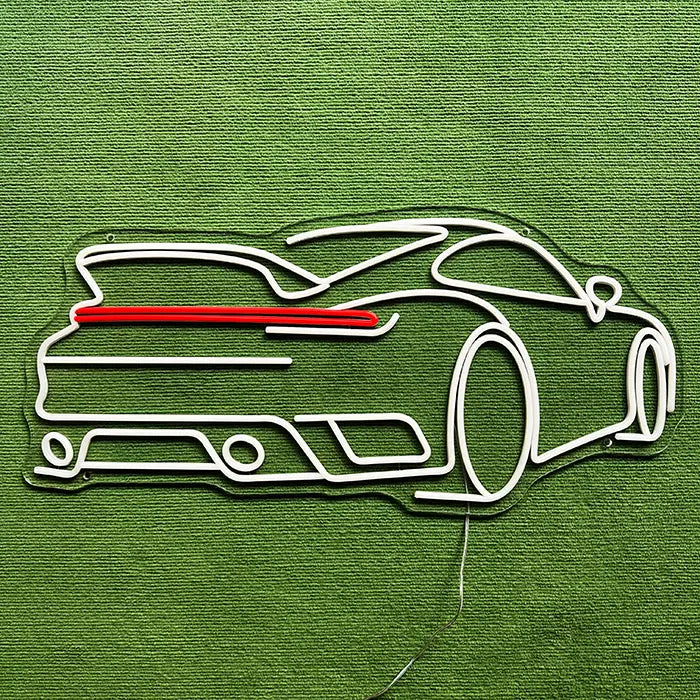GT Sports Car Neon LED Sign switched off on a green surface, full outline visible