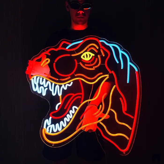 T-Rex Dino Neon LED Sign held in front of the body with both hands