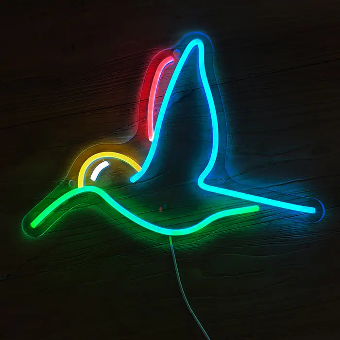 Hummingbird Bird Neon LED Sign lit from the front, long beak in green, wing in blue