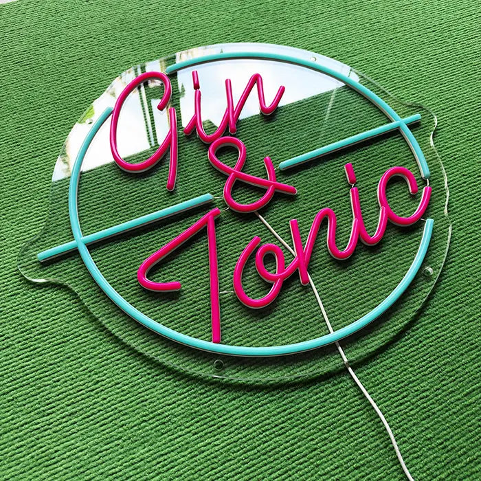 Gin & Tonic Neon LED Sign switched off from above at an angle, neon tubes on clear acrylic