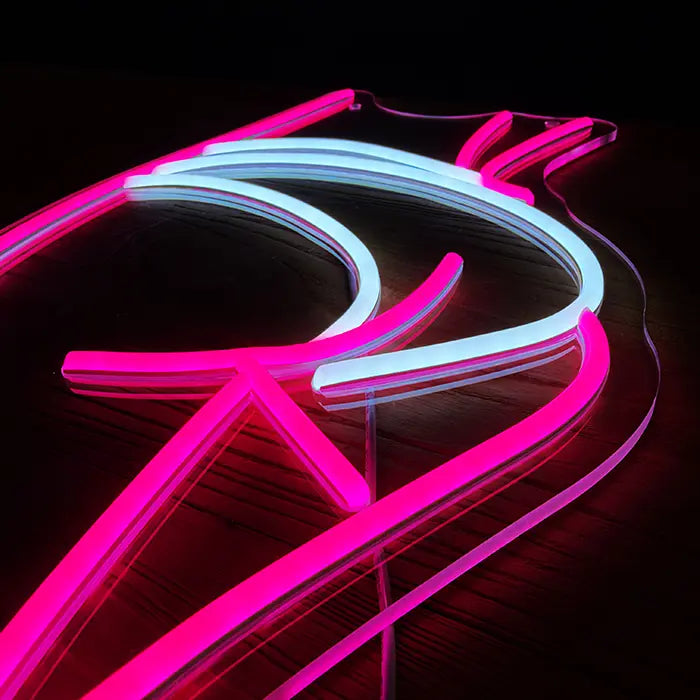 Sexy Boogie Neon LED Sign from above at an angle, pink and white neon tubes on clear acrylic