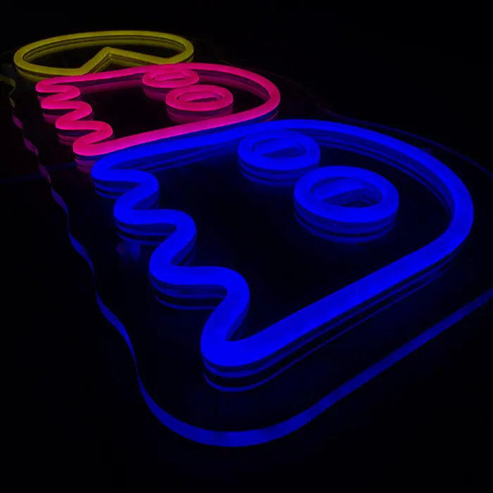 Retro Ghosts Neon LED Sign from the side at an angle, blue ghost raised on clear acrylic