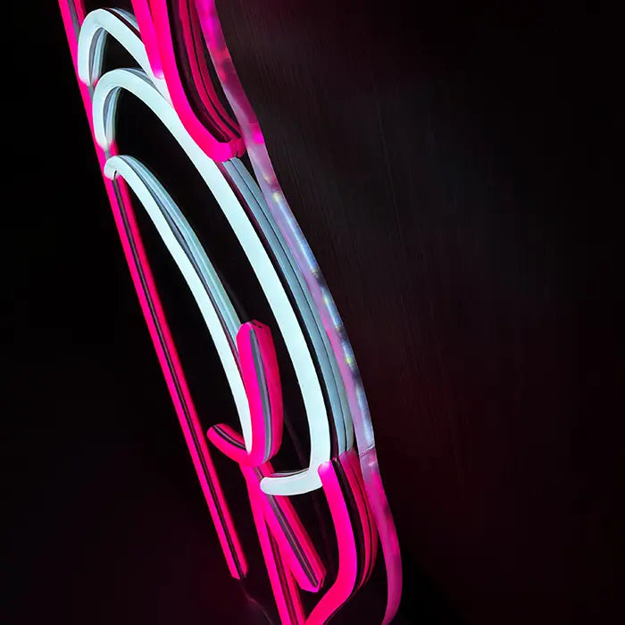Sexy Boogie Neon LED Sign photographed from the side, neon tubes stand out from the panel