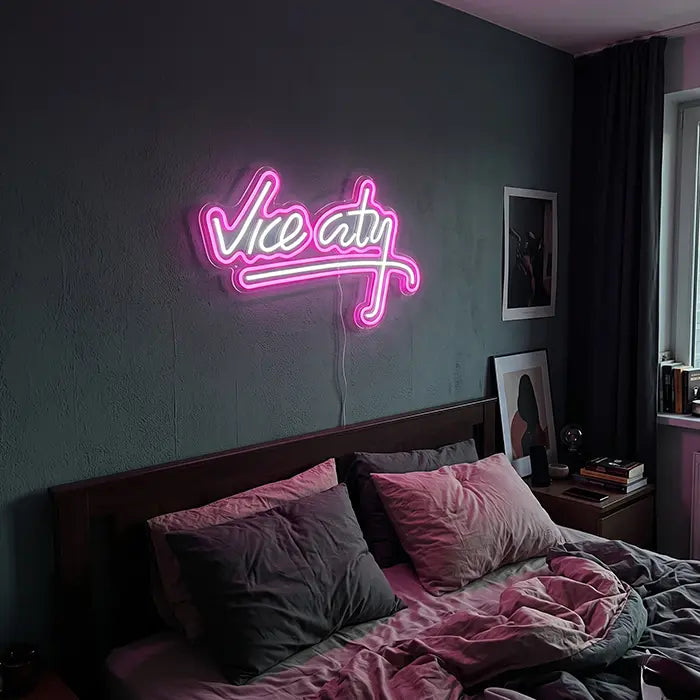 Vice City Original Neon LED Sign on a bedroom wall above the bed