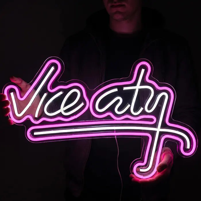Vice City Original Neon LED Sign held in front of the body by a person
