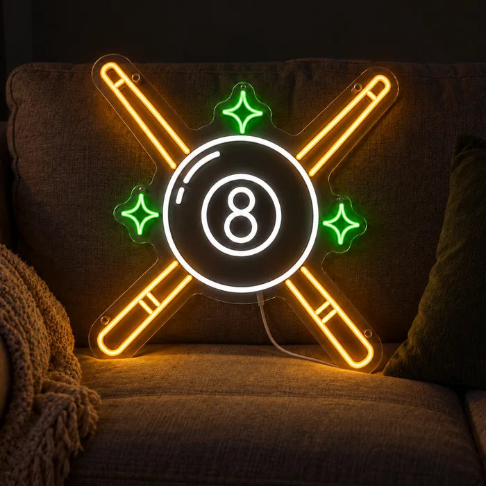 Crossed Pool Cues Neon LED Sign on a cosy sofa between cushions and a throw