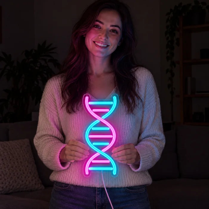 DNA-kierre neon LED -kyltti hymyilevän naisen käsissä tummaa taustaa vasten