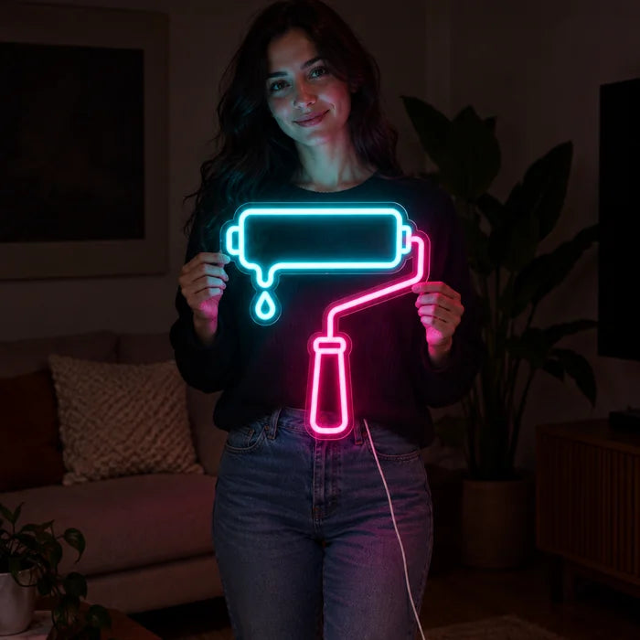 Paint Roller Neon LED Sign held by a woman, showing its size compared to her body