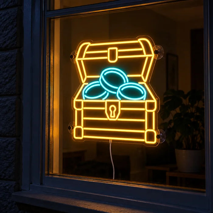 Gold Treasure Neon LED Sign in a window, seen from the street at night