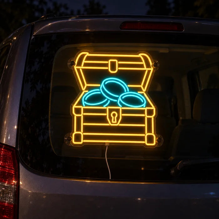 Gold Treasure Neon LED Sign on the rear window of a car at night