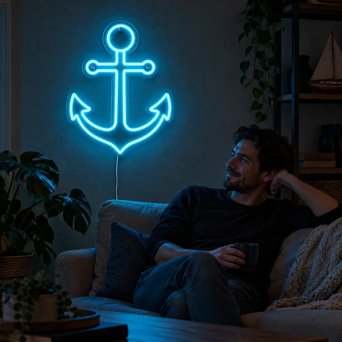 Harbour Anchor Neon LED Sign on a living room wall, a person relaxing on the sofa in front of it