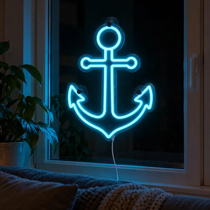 Harbour Anchor Neon LED Sign in the window of a cosy living room in the evening