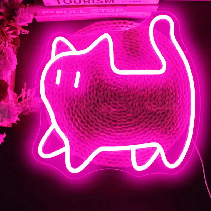 Pinke Katze Neon LED Schild in Rosa leuchtend an einer strukturierten Wand, Katze im Profil mit Schwanz nach oben