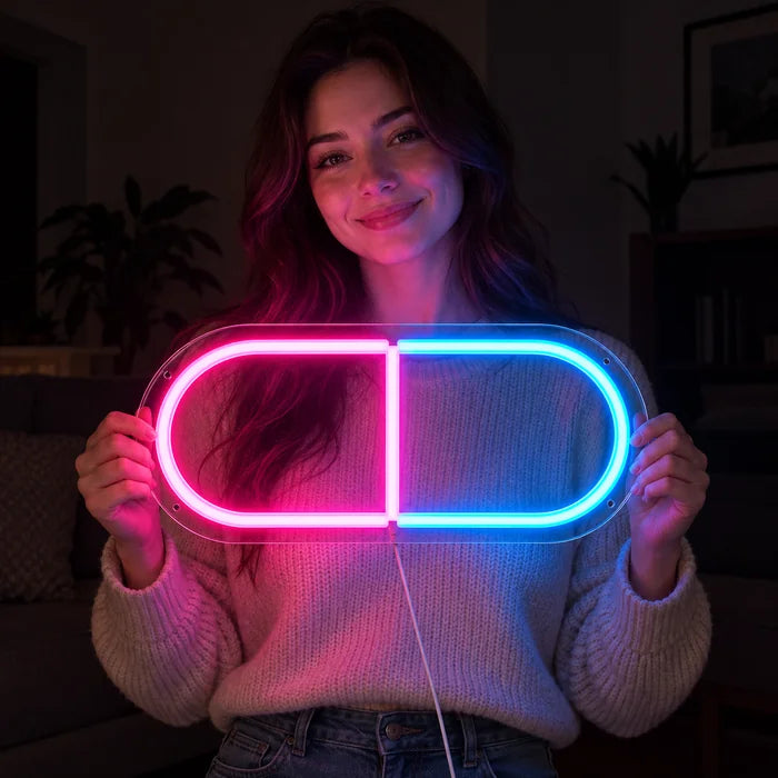 Neonová LED cedule Kapsle léku v rukou usmívající se ženy před tmavým pozadím