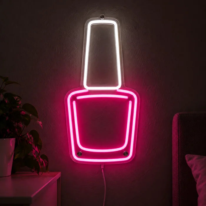 Nail Polish Neon LED Sign glowing on a dark wall, close-up with connection cable