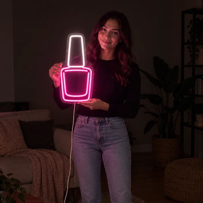 Nail Polish Neon LED Sign held by a woman, showing its size compared to her body
