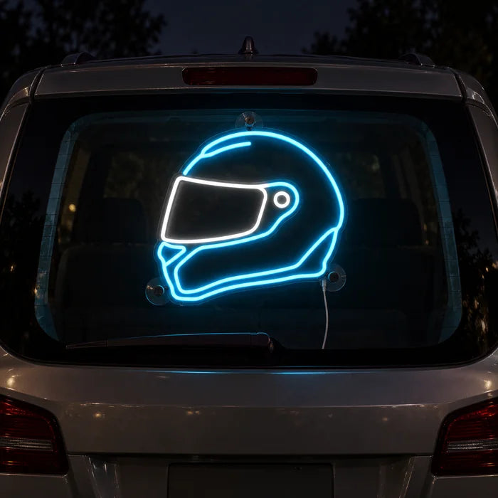 Neon Racing Helmet Neon LED Sign on the rear window of a car at night