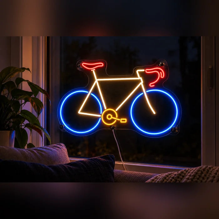 Neon Road Bike Neon LED Sign in the window of a cosy living room in the evening