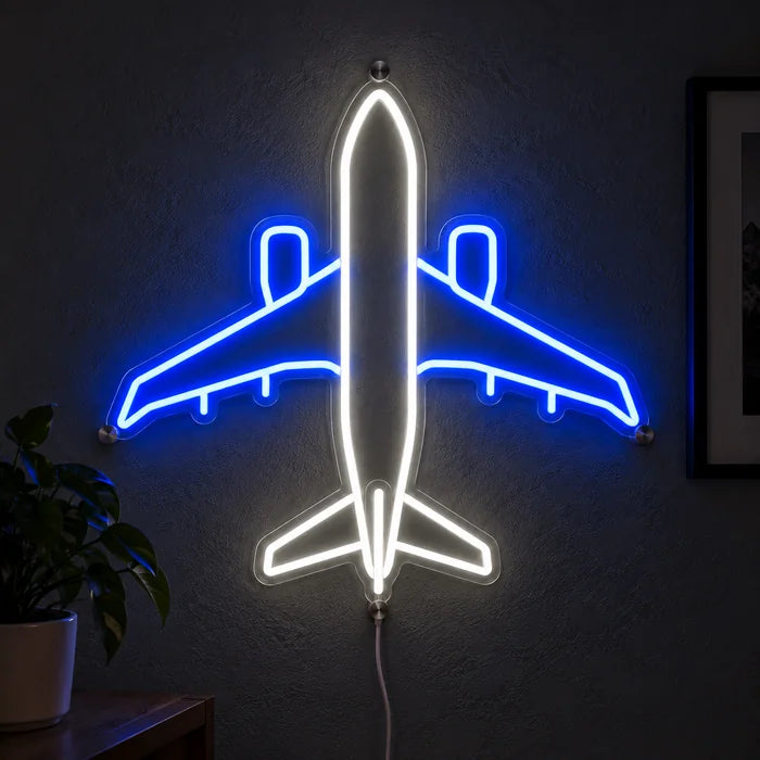 Passenger Plane Neon LED Sign glowing on a dark wall, close-up with connection cable