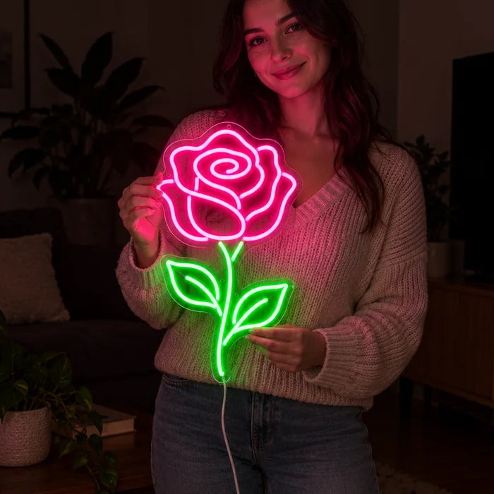 Rose Light Neon LED Sign held by a woman, showing its size compared to her body