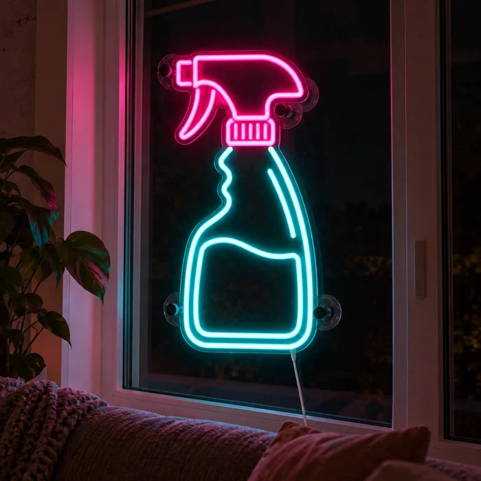 Clean Magic Neon LED Sign in the window of a cosy living room in the evening