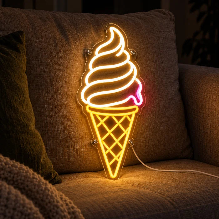 Soft Serve Ice Cream Neon LED Sign on a cosy sofa between cushions and a throw