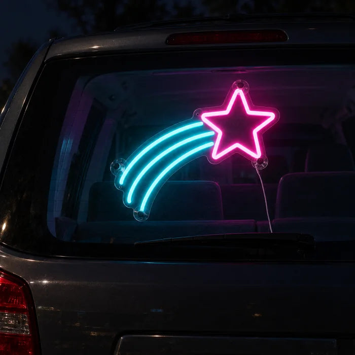 Shooting Star Neon LED Sign on the rear window of a car at night