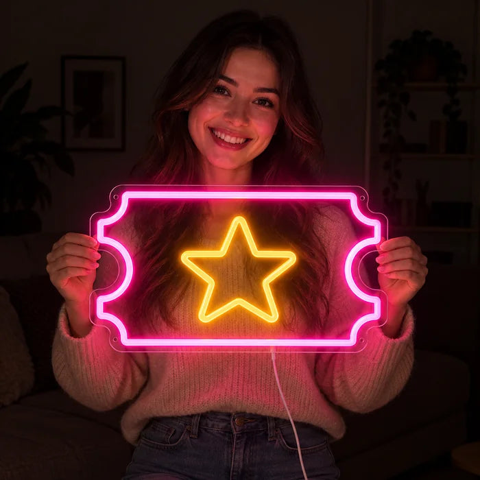 Star Ticket Neon LED Sign held by a smiling woman against a dark background