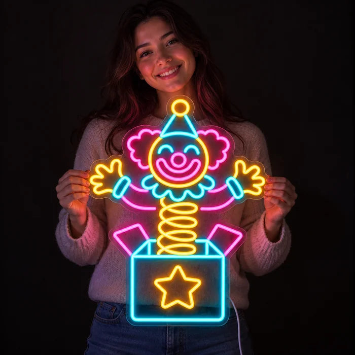 Surprise Clown Neon LED Sign held by a smiling woman against a dark background