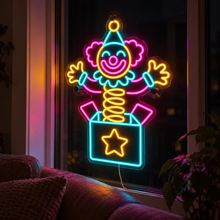 Surprise Clown Neon LED Sign in the window of a cosy living room in the evening