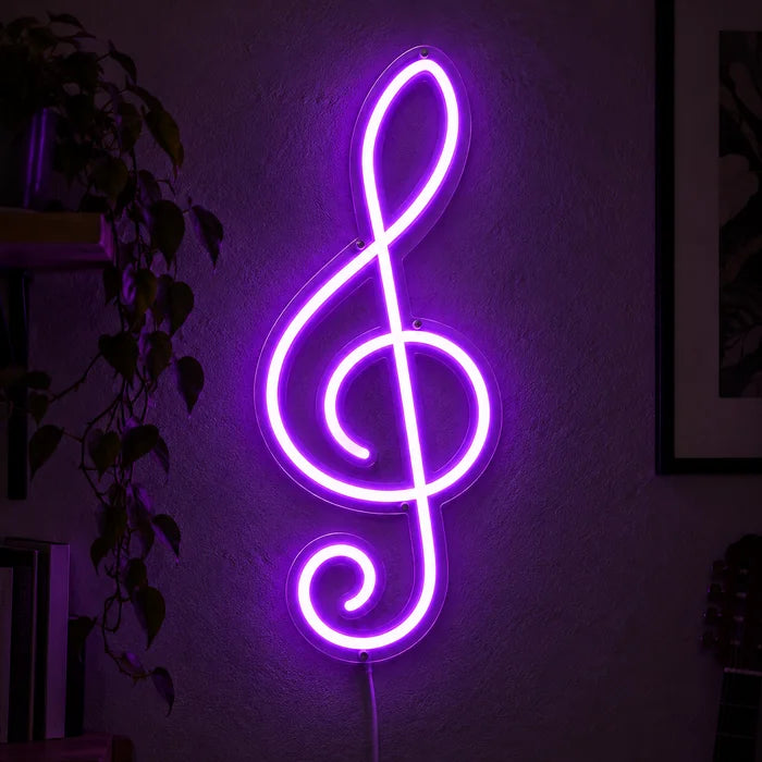 Treble Clef Neon LED Sign glowing on a dark wall, close-up with connection cable