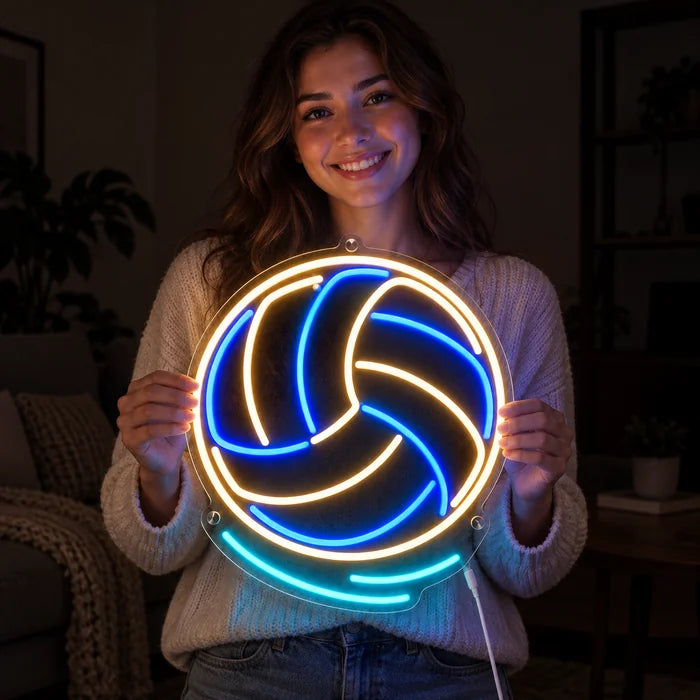 Volleyball Neon LED Sign held by a smiling woman against a dark background