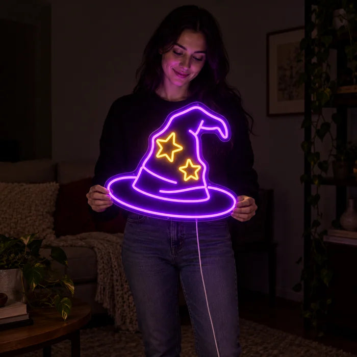 Wizard Hat Neon LED Sign held by a woman, showing its size compared to her body