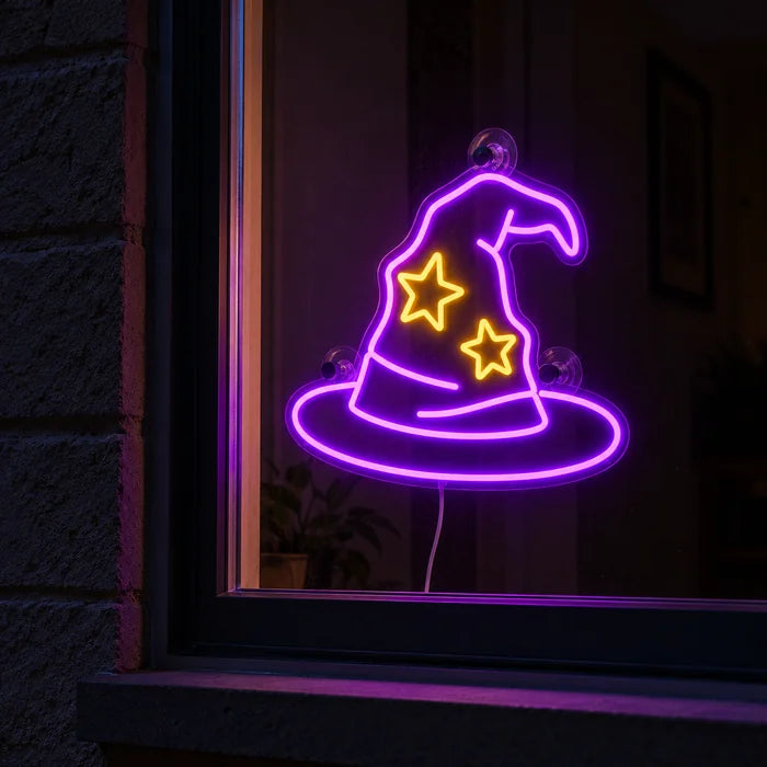 Wizard Hat Neon LED Sign in a window, seen from the street at night