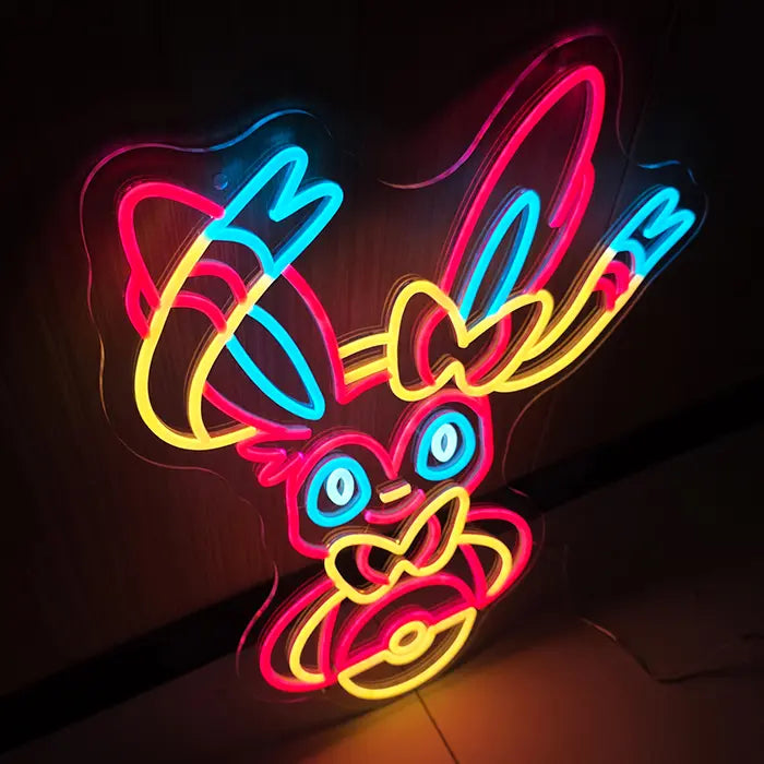 Fantasietier Neon LED Schild leicht angewinkelt aufgestellt, das Neon wirft warmes Licht auf den Boden