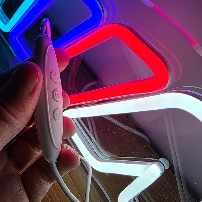 M Stripes neon LED sign, shot from above at an angle, depth of the neon tube visible